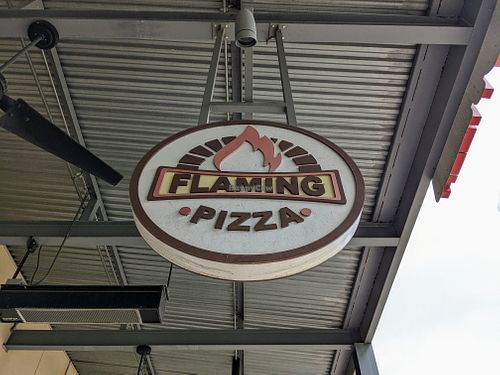 Convenient to "the lawn" in front of IPIC theater. at Flaming Pizza in Austin