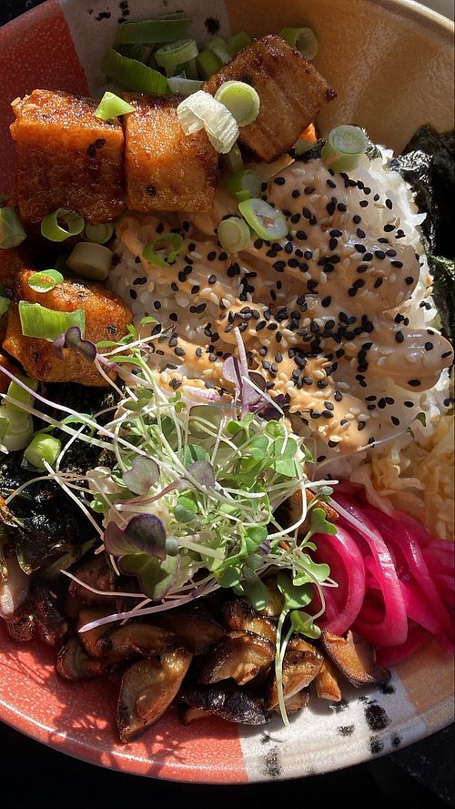 rice bowl (which is vegan as-is: sushi rice, black garlic aioli, roasted sesame seeds, nori, oyster mushrooms, crispy kale, pickled red onions)  at Village Grocery and Refillery in Kingston
