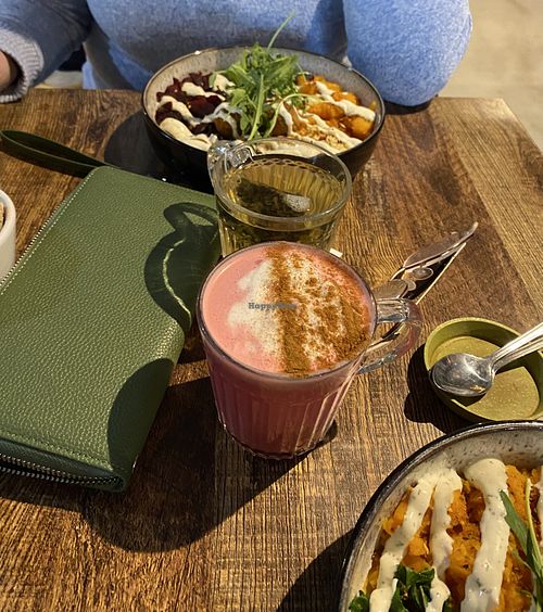 Buddha bowl, green tea and beetroot latte (oat milk)  at Ebike Cafe at Deheers in Weymouth