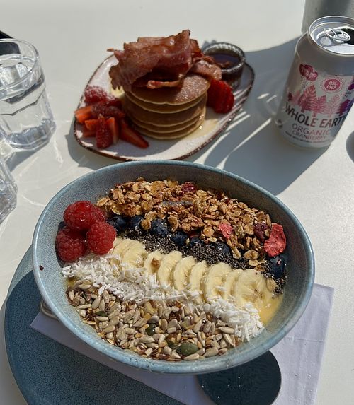 Sunshine Smoothie Bowl and pancakes (not vegan)  at Ebike Cafe at Deheers in Weymouth
