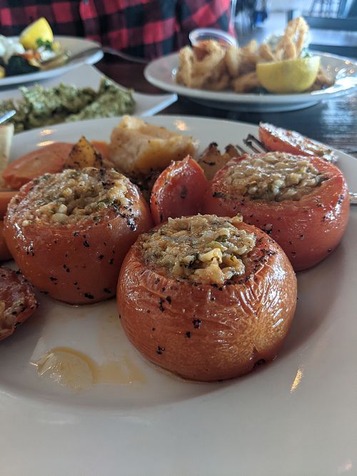 Gemista Stuffed Tomatoes (vegan) 😋. Served with lemony potatoes!  at The Greek in Ventura
