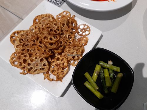Fried lotus root, pickled asparagus at Woka Woka in Sunnybank