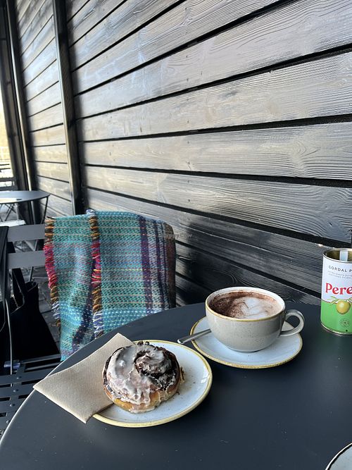 The best cinnamon bun & an excellent coconut hot chocolate  at Tarmachan in Ballater
