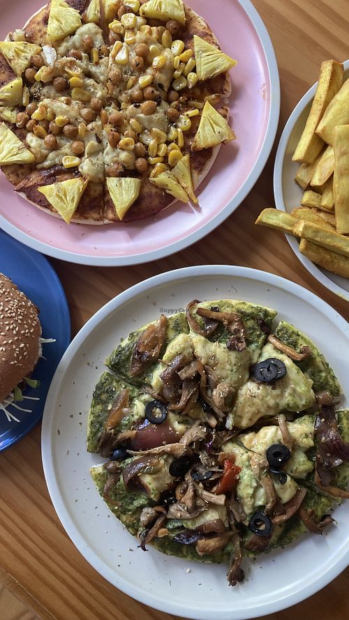 Pesto pizza and hawaiian bbq pizza  at iVegan Supershop Da Nang - Healthy Plant Based Cafe in Da Nang