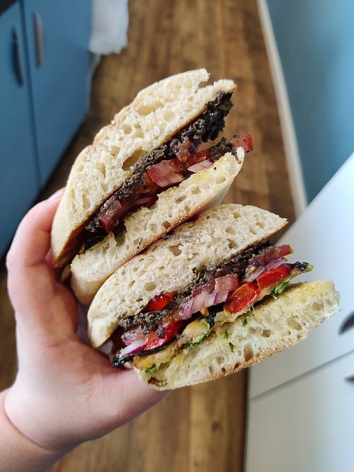 August Special Pan Bagnet Veganised- Tapenade, Grilled Courgette & Pepper, Tomato, Red Onion, Garlic Olive Oil, Parsley and Basil on Ciabatta at Sandwich Heaven in Macclesfield