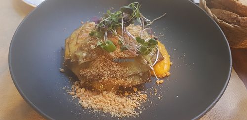 Grilled artichoke with beer marinade and peanuts at Ca n'Ela Vegan Restaurant in Mallorca