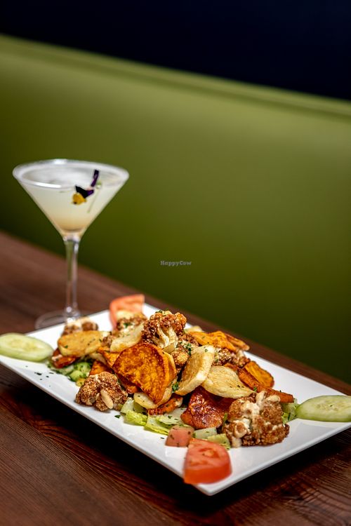 Triple Fries (Cauliflower, sweet potato, traditional potato) and lavender lime cocktail at Allan's Mediterranean Bar and Grill in Middletown