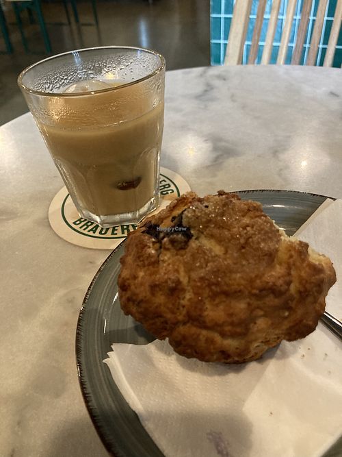Cold brew with oat milk and vegan blueberry muffin   at Bricks & Mortar in Berlin