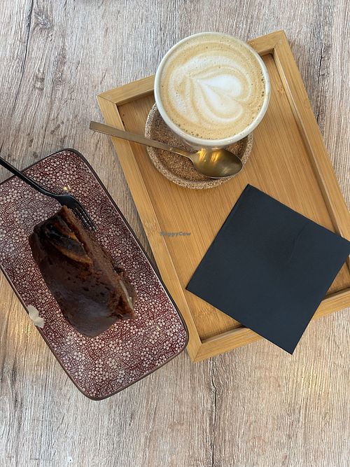 Banana choco bread and oat milk cappuccino  at Bgood in Milan