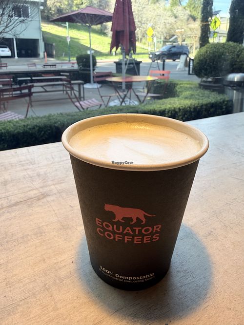 Oat milk latte w/orange spice   at Equator Coffees in Larkspur