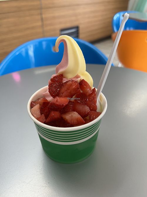 Pineapple Watermelon swirl with fresh strawberries   at Beach Treats Ice Cream and Frozen Yogurt in Myrtle Beach