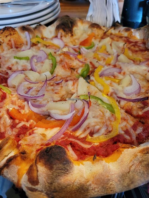 My create-your-own was ny style crust, red sauce, vegan cheese, pineapple, bell peppers, and red onion. at Providence Pizza in Kansas City