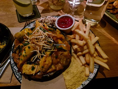 "moqueca" stew 
a colourful brazillian stew with palm hearts, plantains, brussel sprouts, and the fresh flavour of lime, coconut cream, three coloured capsicum, garlic, onion,, red-palm fruit oil at Temple Brewpub  in Brunswick East