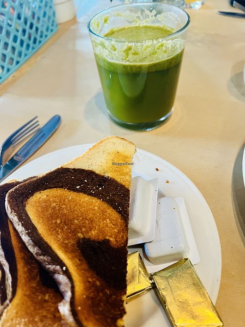 Rye toast and the veggie juice    at Three Little Birds Cafe in Charleston