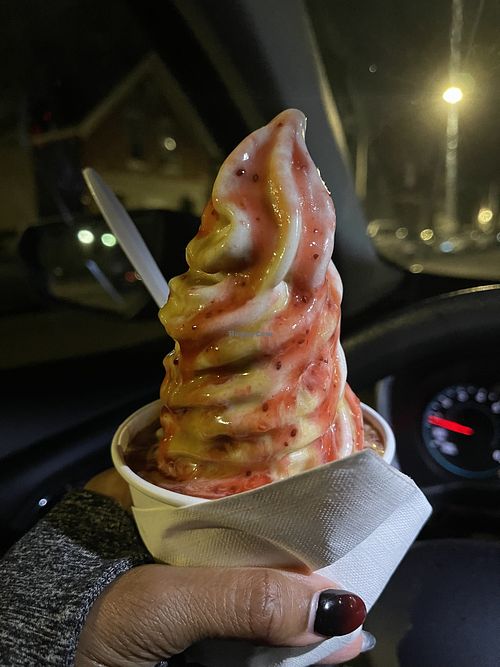 Vanilla oatmilk soft serve with strawberry and caramel sauce OMG!  at Vaca's Creamery in Chicago