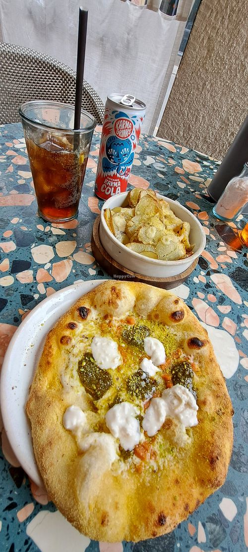 Pistachio pesto pizza and garlic potatoes at Purezza in Manchester