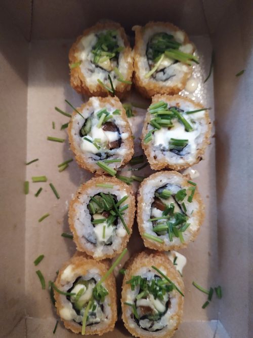 Tempura sushi with salmon and sauce hollandaise at Loco Sushi in Hamburg