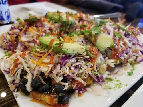 Vegan Tostones with black beans at Arepitas in Round Rock
