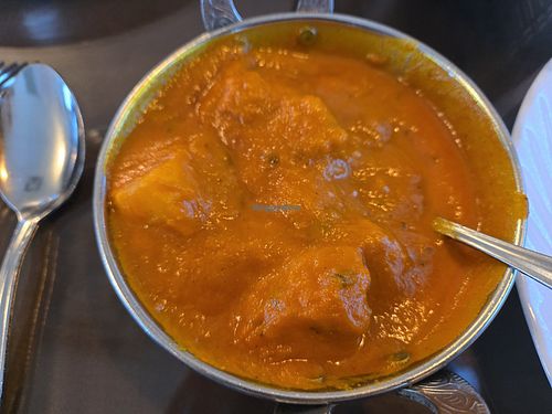 ALOO VINDALOO

Wedges of potatoes cooked with onion gravy with a touch of tomato sauce and vinegar at Taj Mahal in Terre Haute