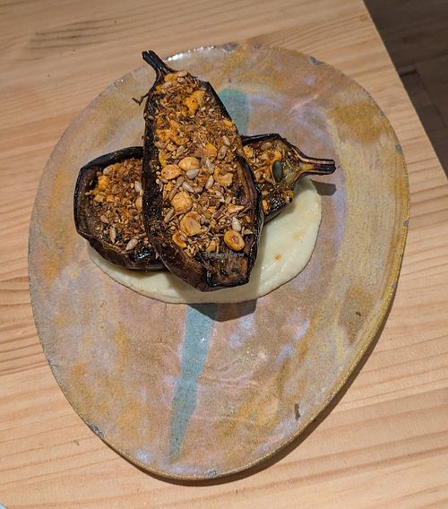 Berenjena asada pil-pil de coliflor, chimichurri y dukkah at Suquía Café in Mallorca
