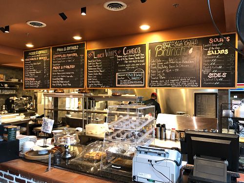 Menu boards and pastry cases at Pasha Mezze in Norfolk