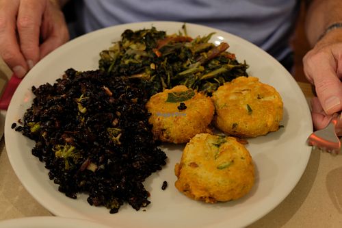Mixed dish- croquettes, black rice, vegetables at La Cucina Dei Colori in Catania