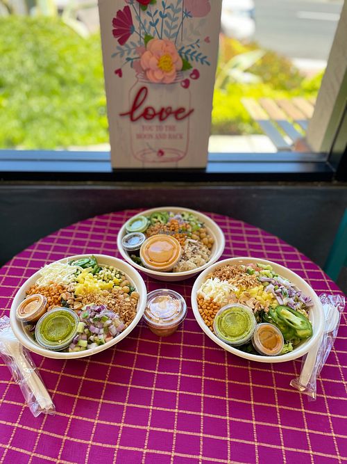 Our most popular Mango Tango and All About the Makhani Bowls at Eats Meets West Bowls in Redwood City
