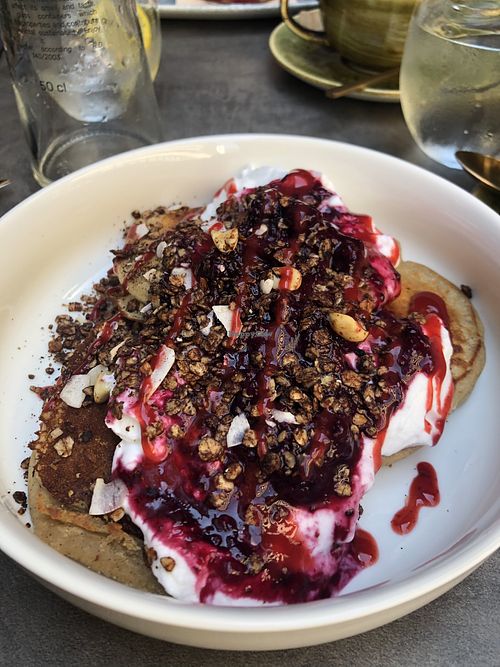 Buckwheat pancakes with coconut cream and berries. Yummy!  at Noranta Tres in Escaldes-engordany