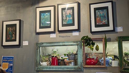 Artwork on the walls at Art Food Corner in Funchal