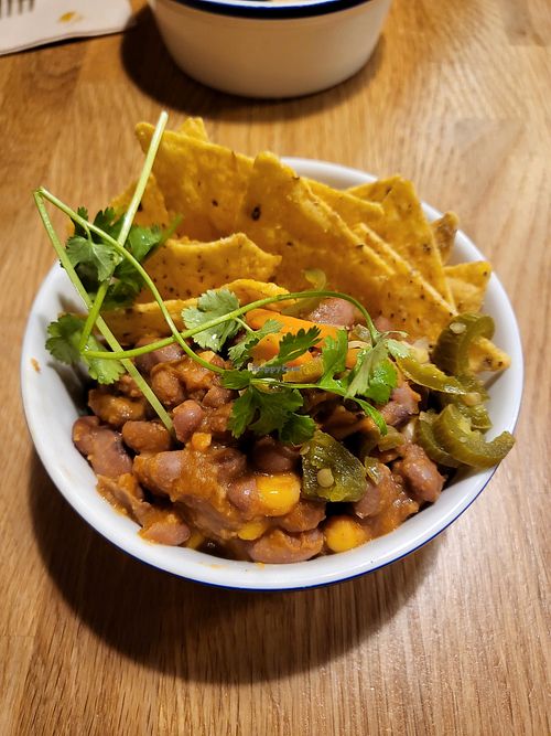 Spicy chili with beans, corn, jalapeno, cilantro, corn at Lanbroa in Pamplona