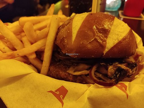 Magic mushroom truffle and Swiss vegan burger with fries at The Tavern in Prague