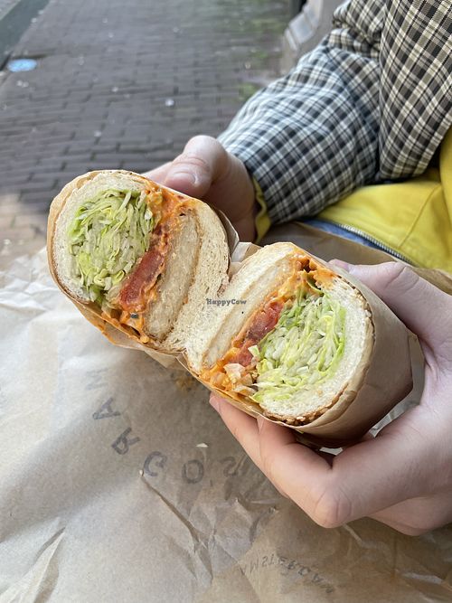 Crispy « chicken » chili mayo sandwich on while wheat oat bread  at Margo's Amsterdam - Jordaan in Amsterdam