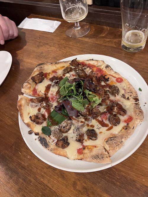 Pizza  at Unique (V) Pizzeria SUKHASANA in Osaka