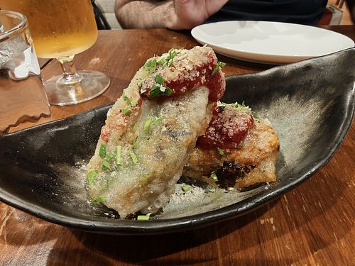  at Unique (V) Pizzeria SUKHASANA in Osaka