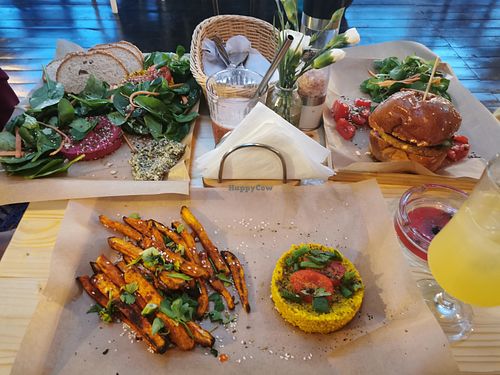 Vegan burger, beet hummus, bulgur salad, sweet potatoes at Acaju in Iasi