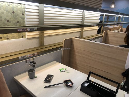 All seats have the train track nearby at Saute Sushi 素特•素司 in Central Singapore