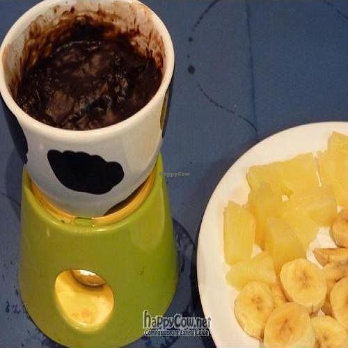 Chocolate fondue with fruits. at A Flama in Zaragoza