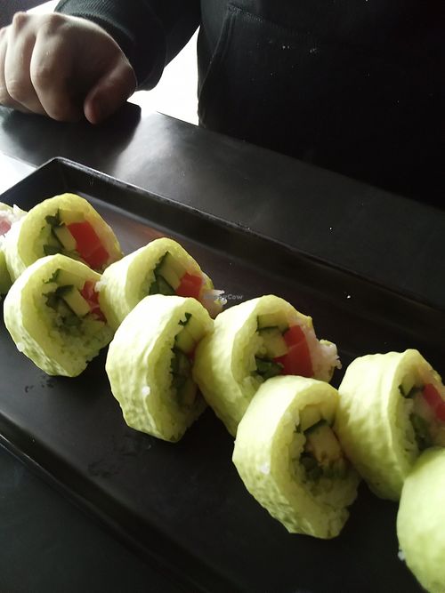 Grinch Roll vegan tuna, avocado, asparagus, cucumber wrapped in green soy paper  at Sakana in Rocky River