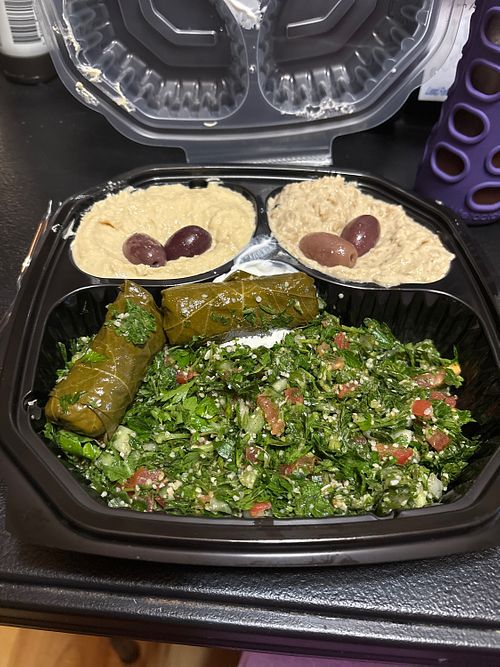 Neomonde Platter(hummus, baba ganouj, stuffed grape leaves, tabbouli… vegans should ask for no labneh which has dairy in it)  at Neomonde Mediterranean in Raleigh