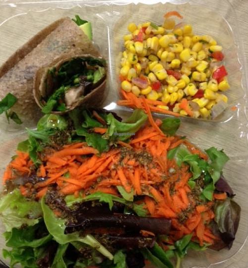 Spinach Portobello in coconut wrap, corn salad and side salad with Herbes de Provence house dressing.  Excellent raw vegan lunch! at The Garden Kitchen in Houston