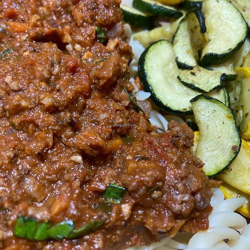 Walnut Cauli Carrot Bolognese over Fava Bean Fusilli with Air Fried Squashes at Nourishing Empowerment in Cypress