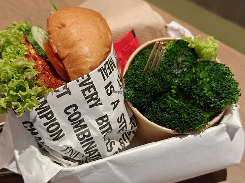 Hainanese chicken-less burger with cup of broccoli at VEGANBURG - Eunos Flagship Outlet in East Singapore