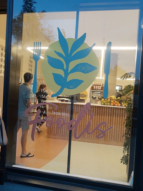 Window logo  at Foodis in Sant Just Desvern