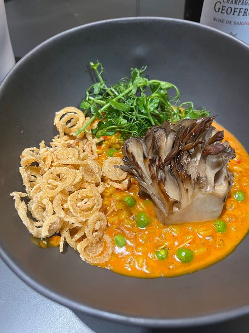 Charred banana, pearled barley, maitake mushroom, and peas.  at MITA in Washington