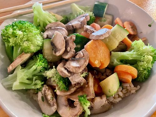 My brown rice bowl with steamed veggies.   at 620 State in Bristol