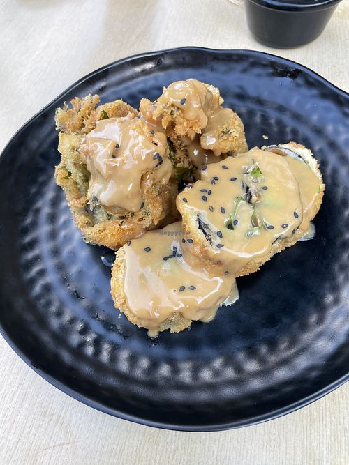  Covered in the peanut sauce!  at Seadog Sushi Bar in Chicago