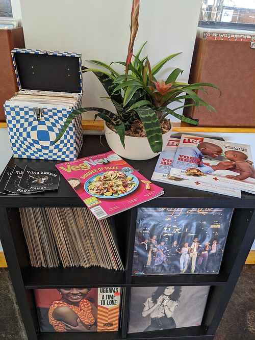 Some of the vinyl collection, with magazines at Mo' Brunch + Brews in Houston