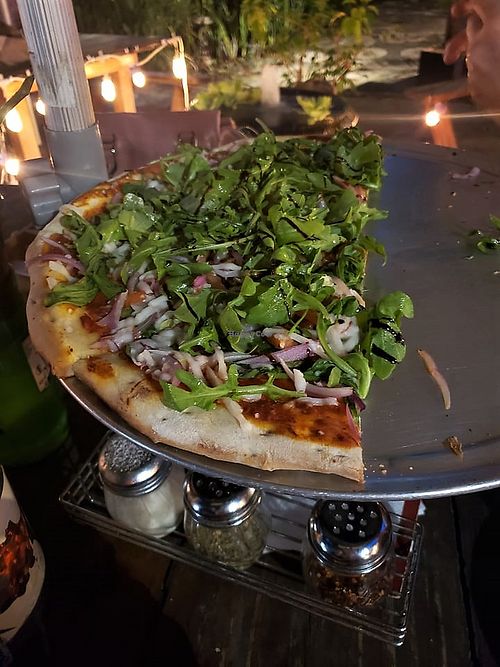 Avocado mash, tomato [vegan cheese], red onion, artichoke hearts, spinach, arugula, micro greens, lemon truffle dressing, balsamic reduction.  YUM!  at Za Rock in St Thomas