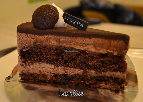 The cake was pretty dry, but the ganache, mousse, whipped cream, and LH topper were all pretty good. at Loving Hut Gangnam-gu - 러빙헛 in Seoul