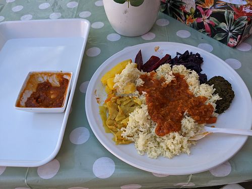 Rice, spicy lentil sauce, and a lot of tasty veggies. at Sara's Äthiopische Küche in Stuttgart